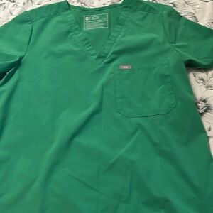 Used women’s uniform top
